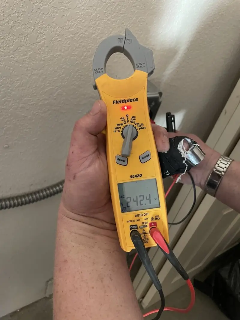Voltage testing with clamp meter during Electrical Installation Services in Southbridge Town